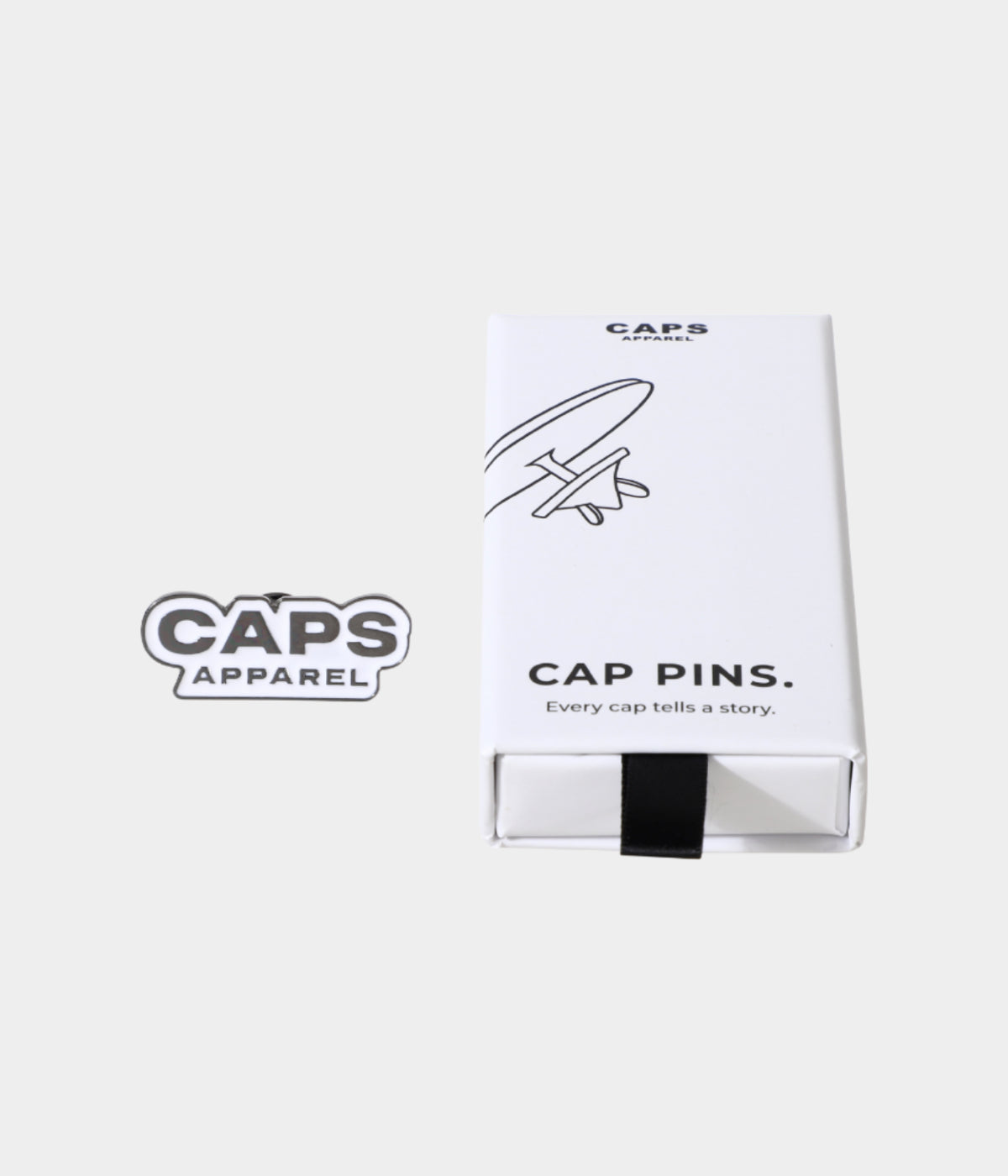 CAPS APPAREL PIN.